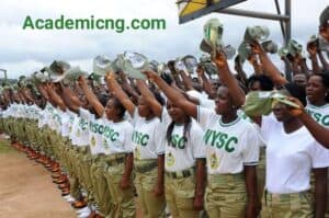 NYSC corpers holding their caps