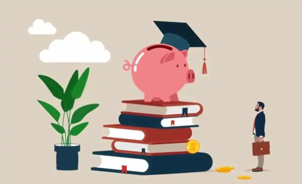 graduation cap on piggy bank