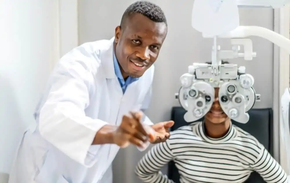 optician doing optometry exam