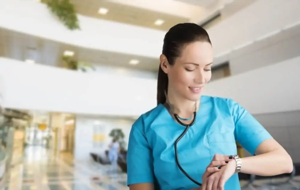 nurse checking time for shifts