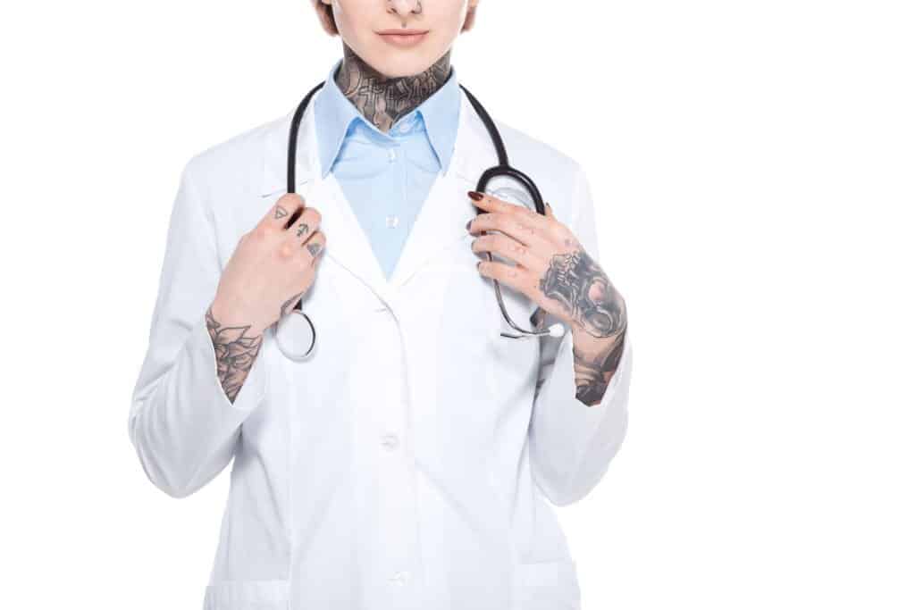 female doctor with tattoos